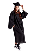 Bachelor’s Regalia Set – includes black bachelor’s gown with pockets and mortarboard cap with year-dated tassel with program color for official commencement.