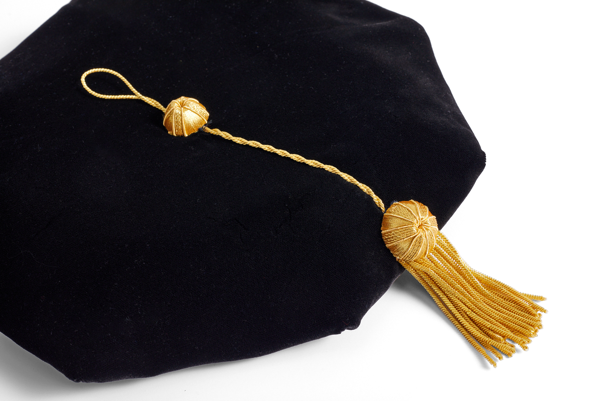 University of New Mexico doctoral tam old-gold bullion tassel detail