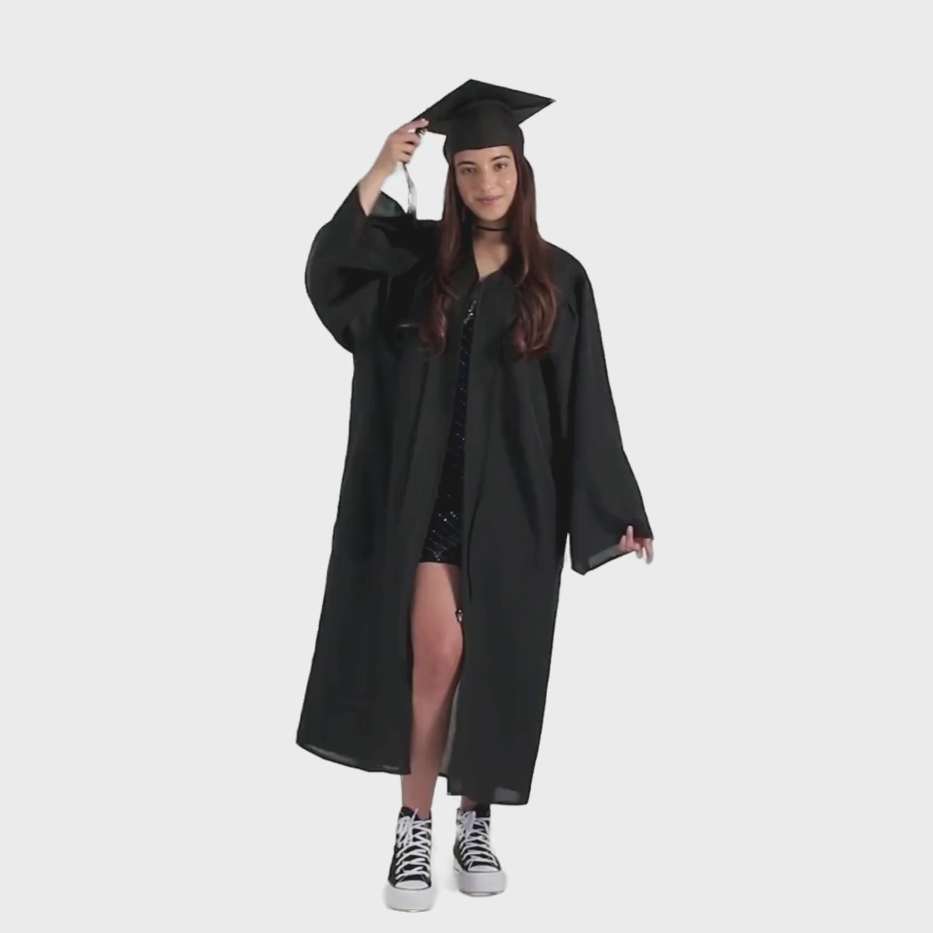 Bachelor’s Regalia Set – includes black bachelor’s gown with pockets and mortarboard cap with year-dated tassel with program color for official commencement.