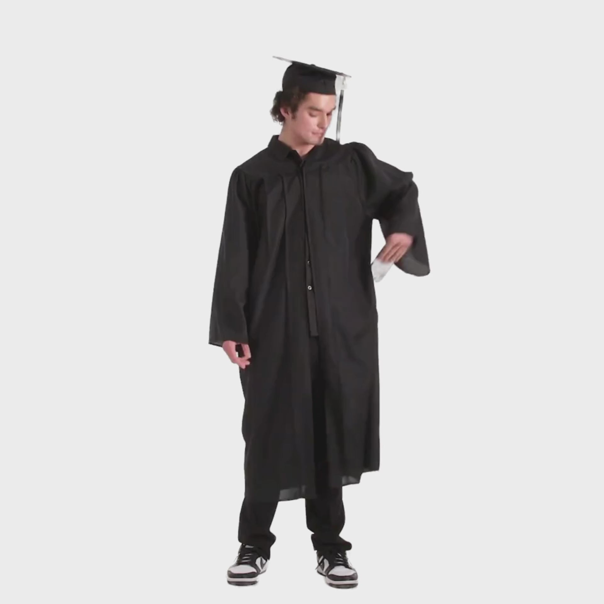 Bachelor’s Regalia Set – includes black bachelor’s gown with pockets and mortarboard cap with year-dated tassel with program color for official commencement.
