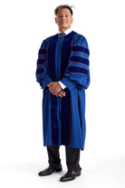 Pepperdine University doctoral gown in dark blue with blue velvet panels and chevrons