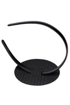 The CAPGOWN CapStay flipped to show how to put the headband in against white background