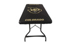Black University of Colorado table cover with the CU Buffs logo in the center and “COLORADO” printed on the front edge, fitted on a standard folding table. Side view.