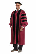 Complete maroon doctoral regalia set with gown, hood, and tam