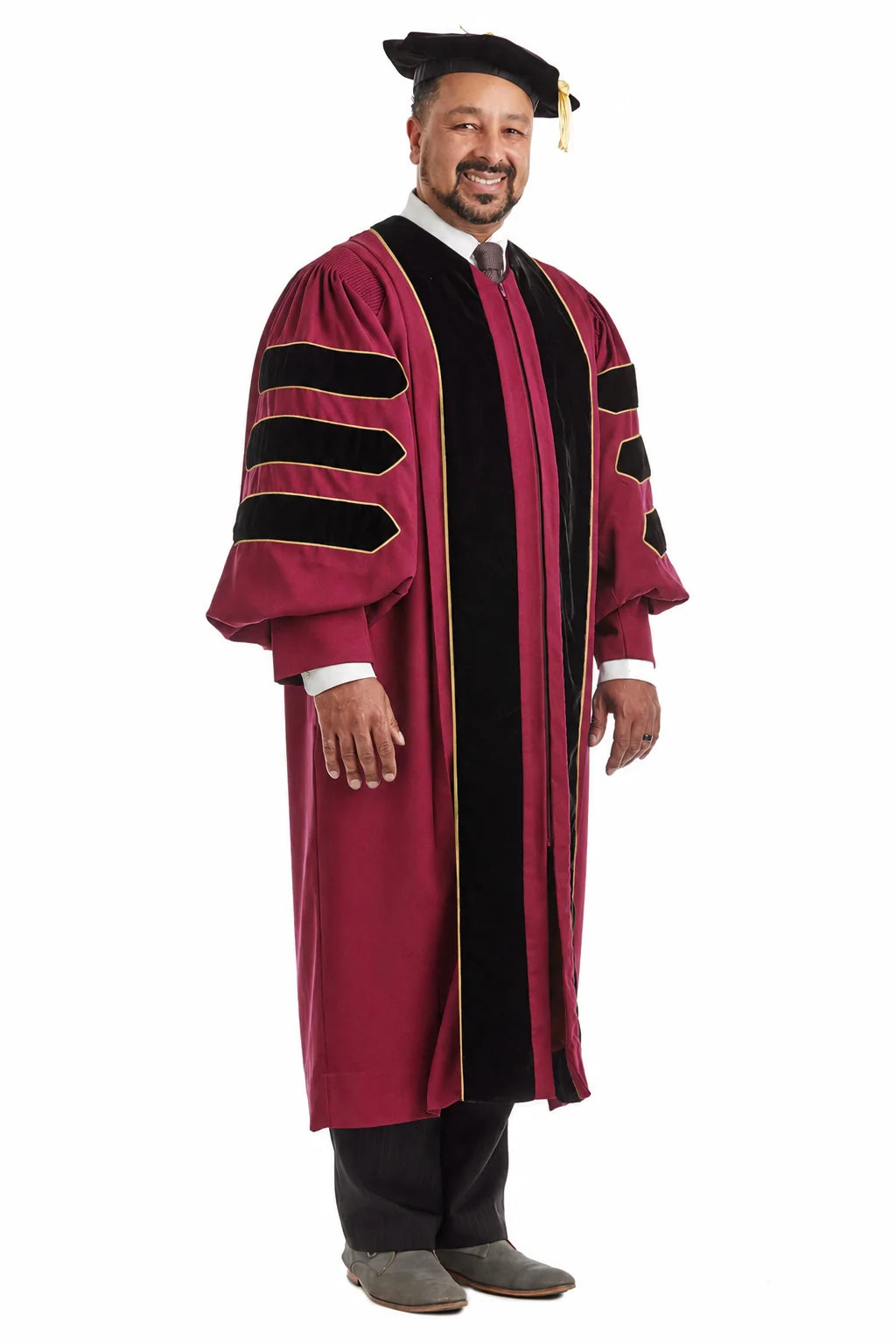 Complete maroon doctoral regalia set with gown, hood, and tam