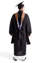 UBIS Master’s Regalia Set – includes black master’s gown with pockets, mortarboard cap with year-dated tassel, UBIS Master of Business Administration hood , and matching sash for official graduation ceremony.