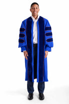 University of Florida blue doctoral gown with blue velvet panels and orange piping