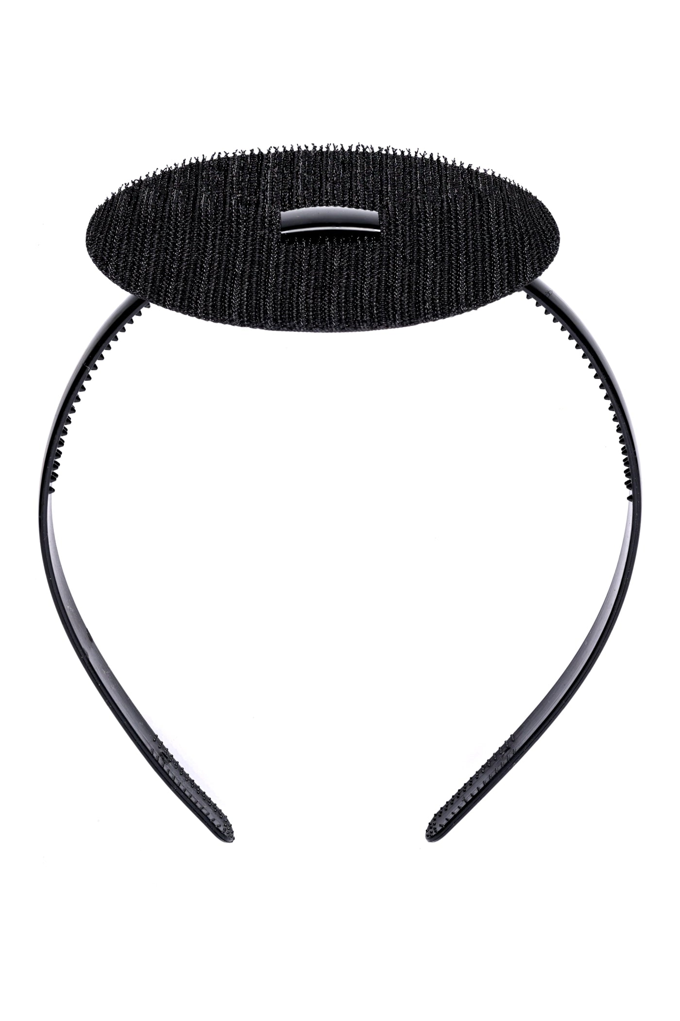 The CAPGOWN CapStay headband with velcro and plastic band against a white background